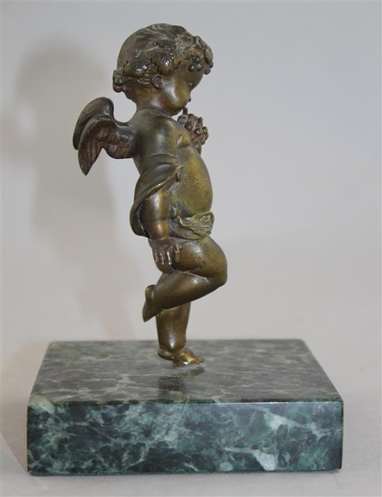 A Continental patinated bronze model of Cupid, 5.5in.